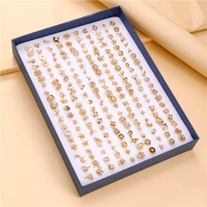 Mini pendientes dorados (un par)