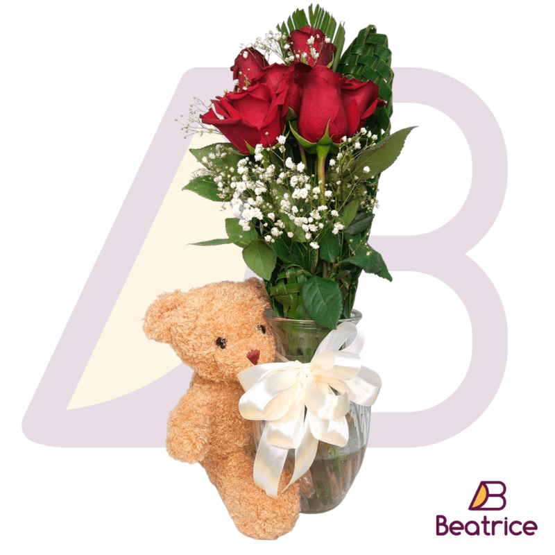 Florero de rosas con peluche